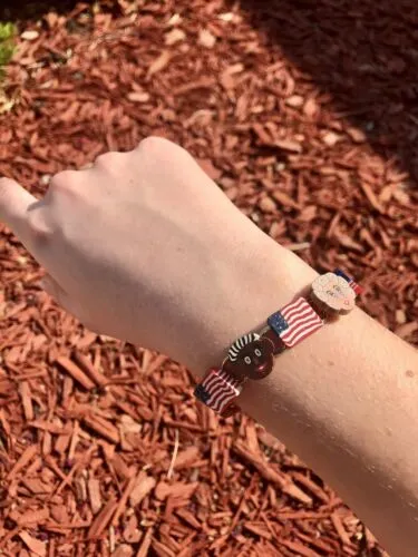 American Equality Multi Color Faces Flag Gold Tone Charm Bracelet