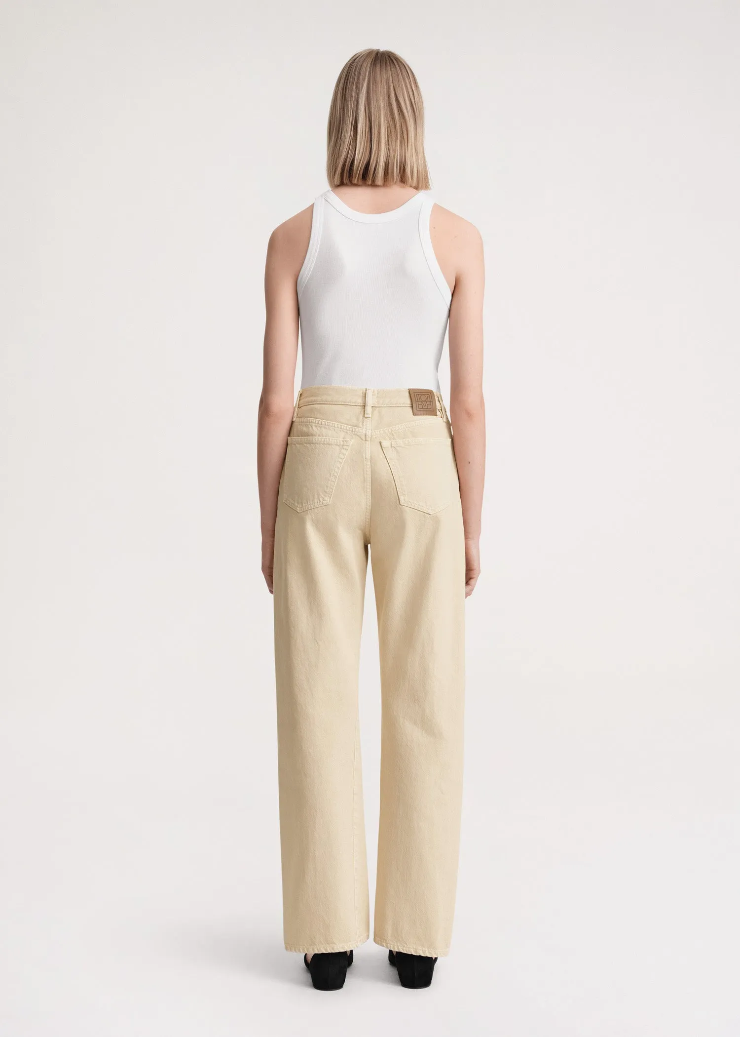 Twisted seam denim full length washed beige